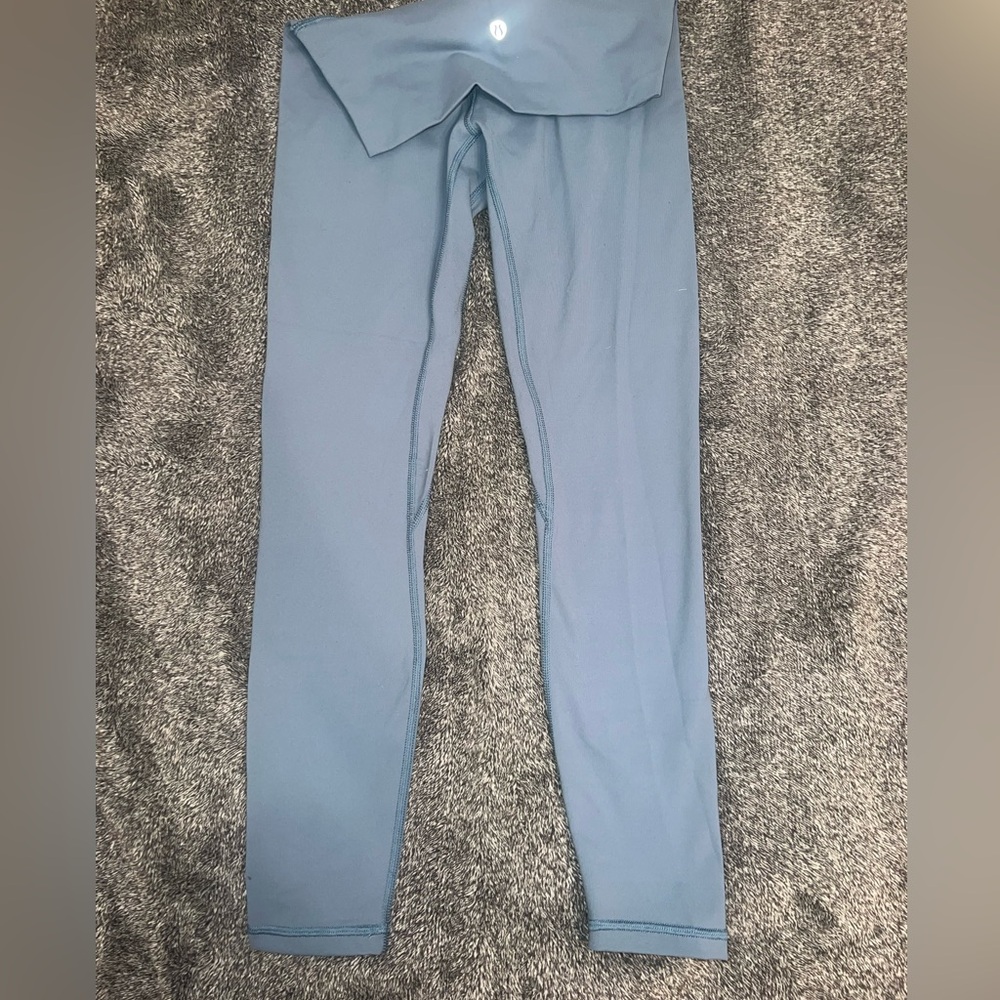 light blue lululemon leggings, size 4 but could fit 2
